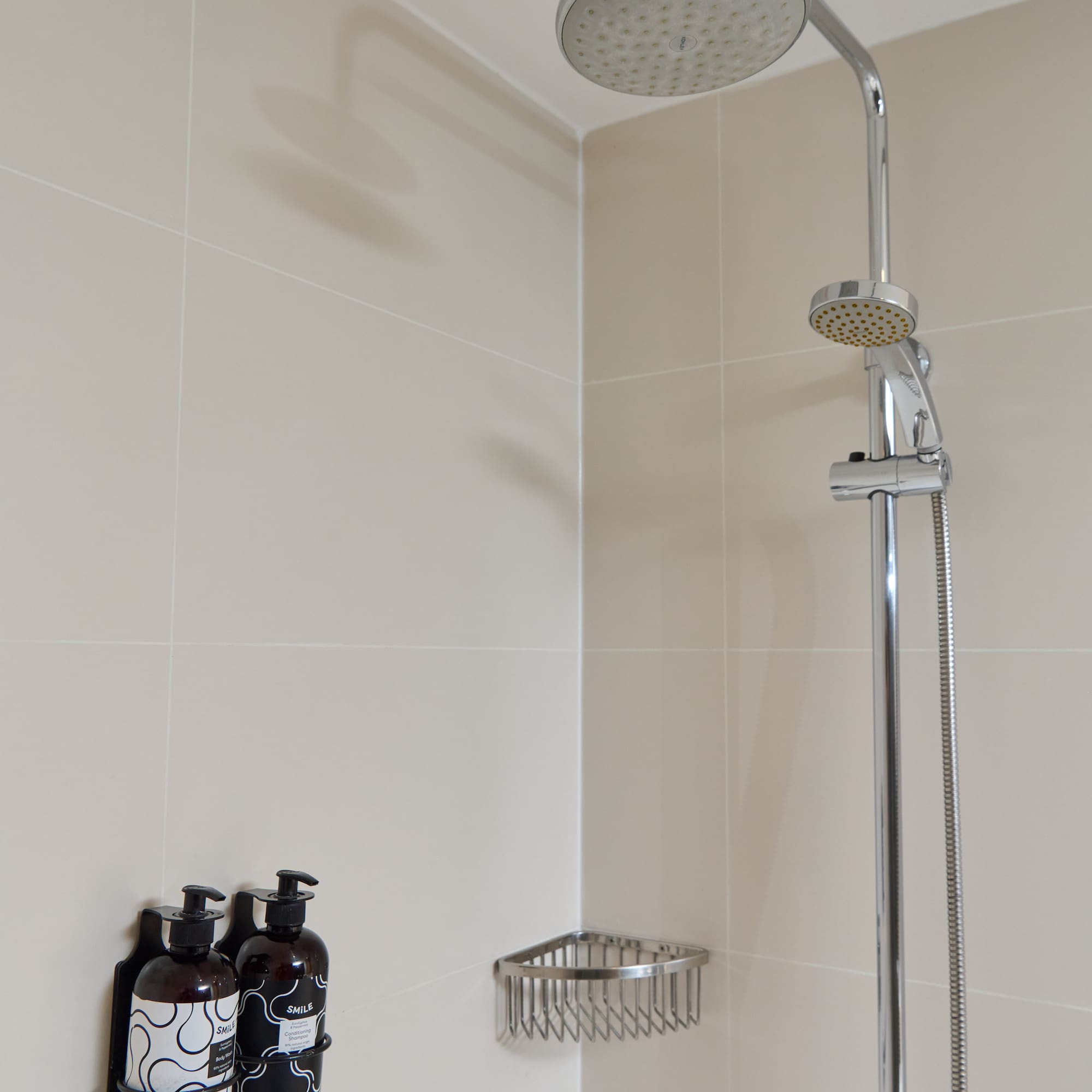 a shower head in a bathroom
