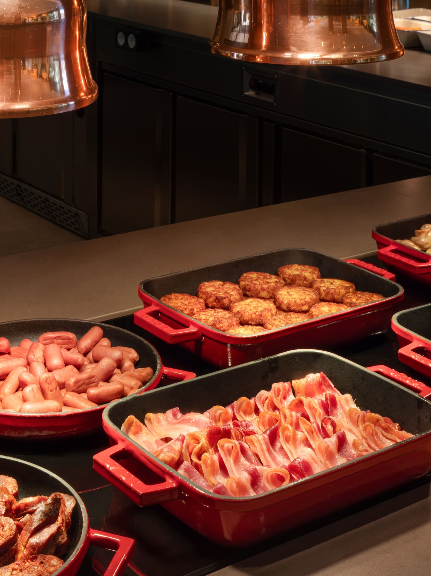 a group of pans with food in them