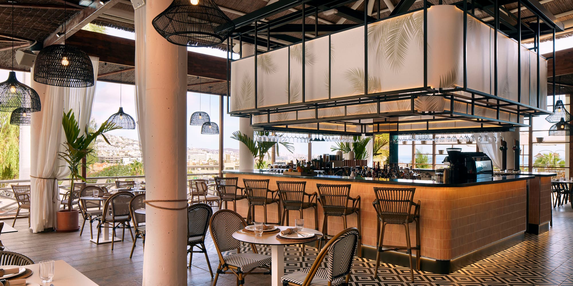 a restaurant with tables and chairs