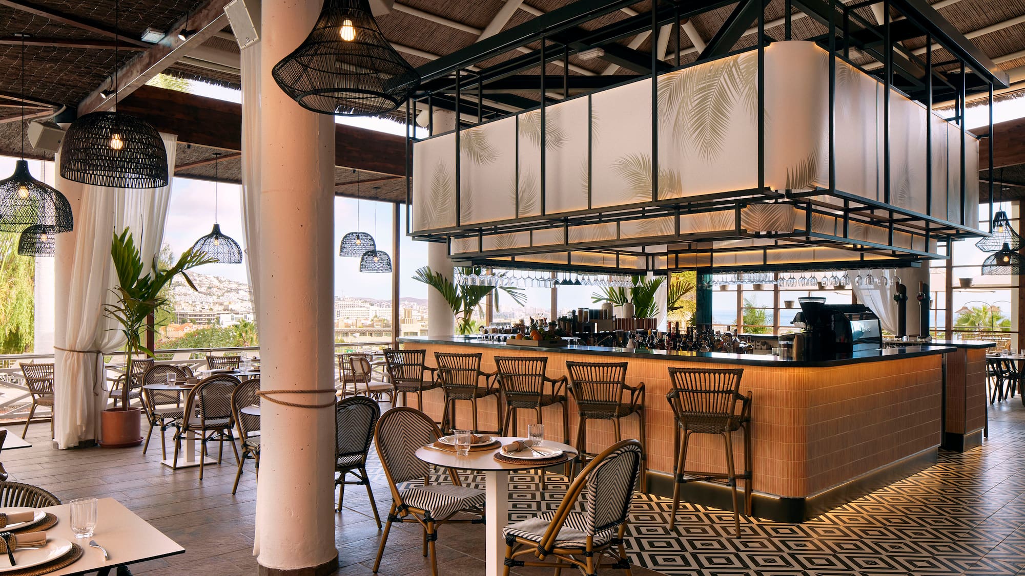 a restaurant with tables and chairs