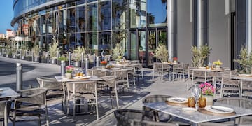 a tables and chairs outside of a building