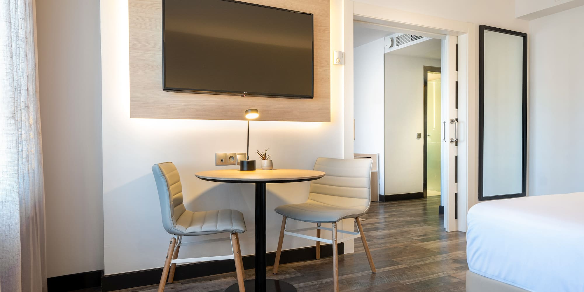 a room with a table and chairs