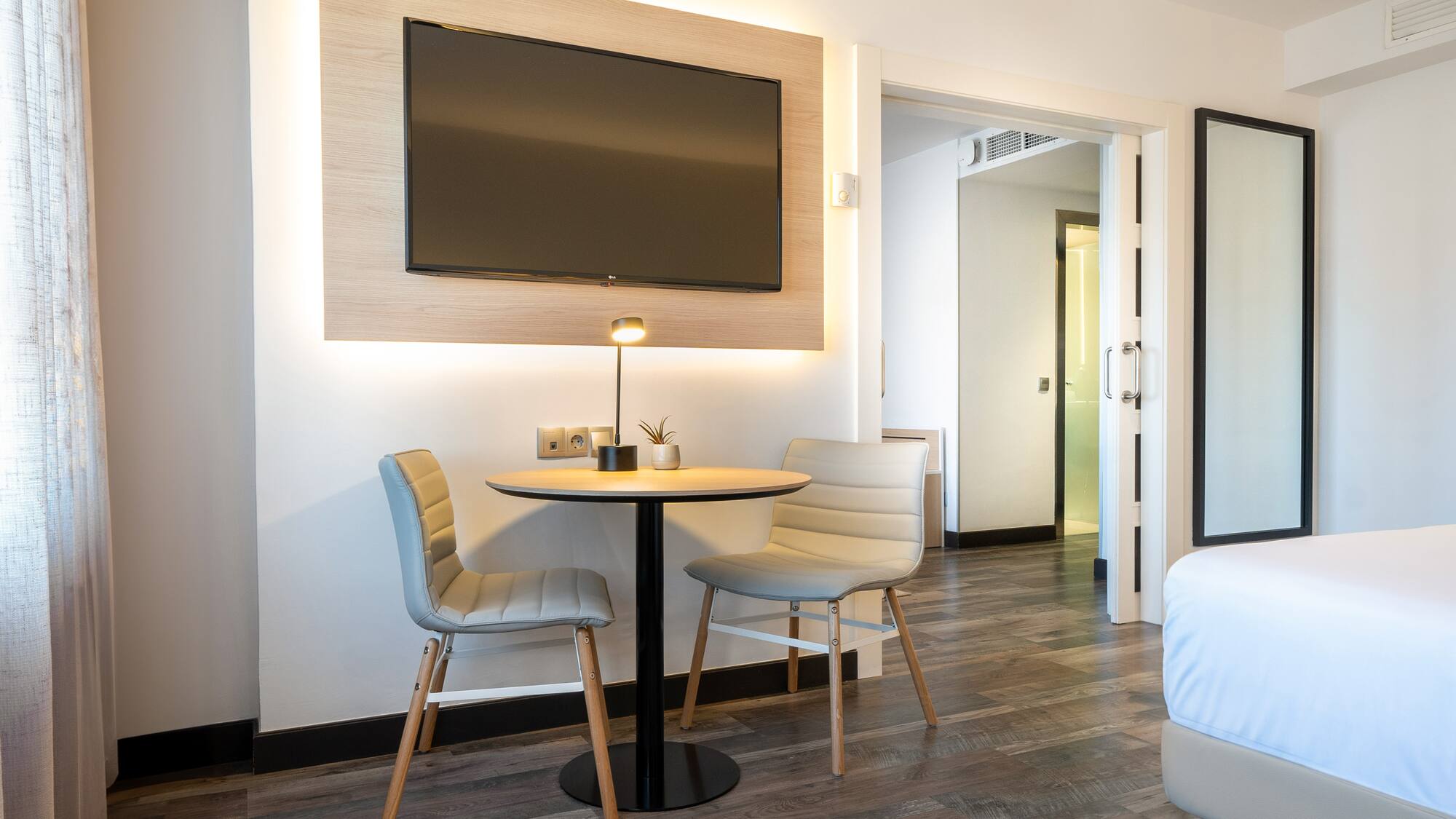 a room with a table and chairs