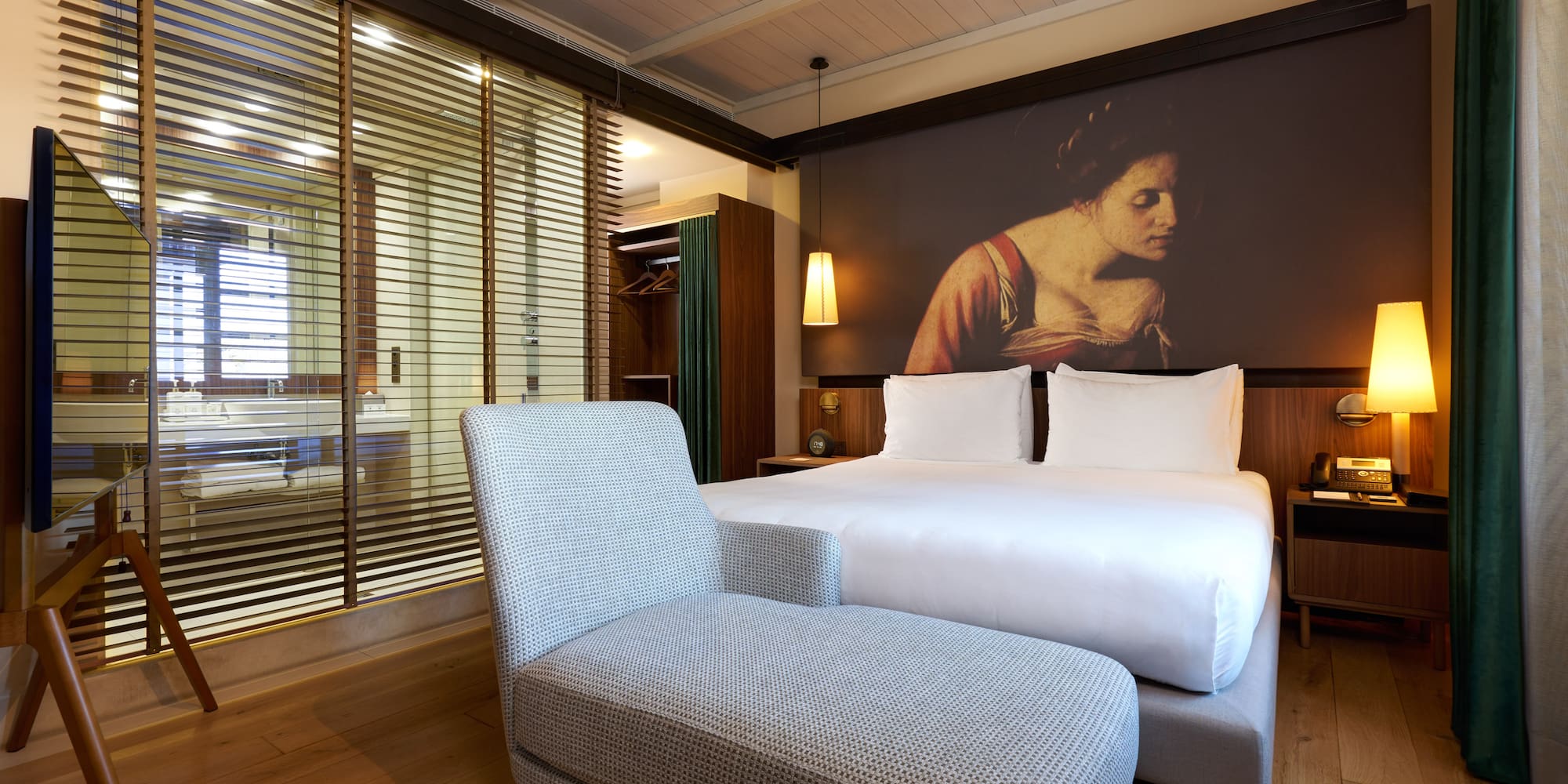 a bed and a chair in a room