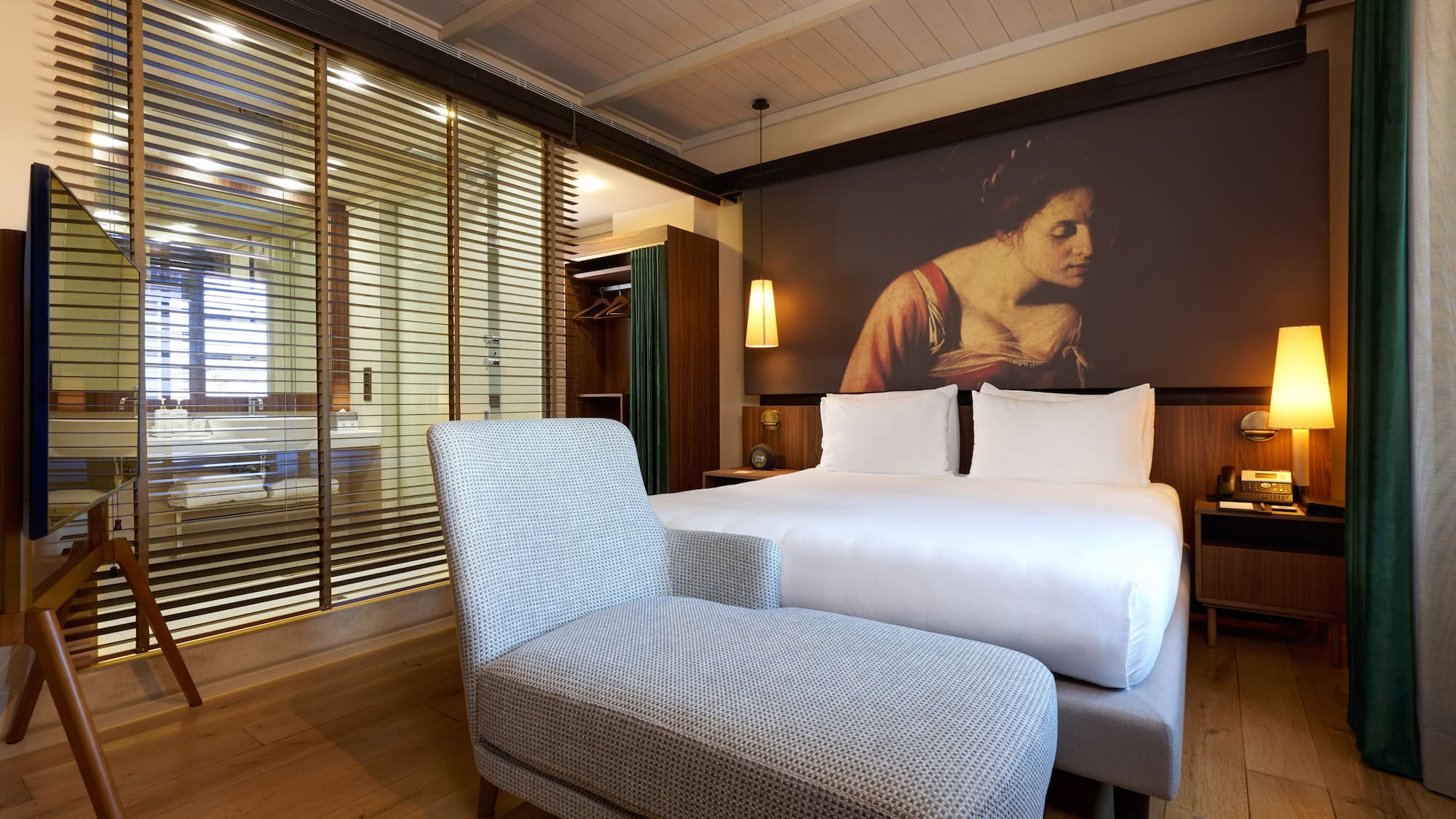 a bed and a chair in a room