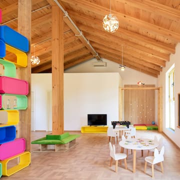 a room with a table and chairs