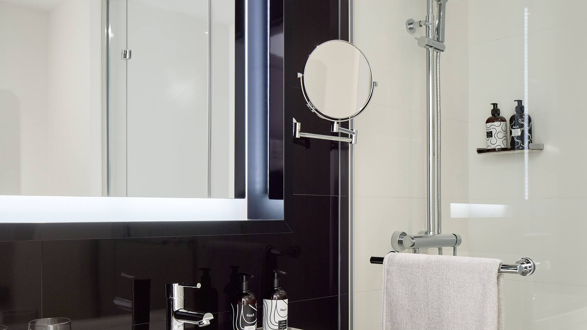 a bathroom with a mirror and sink