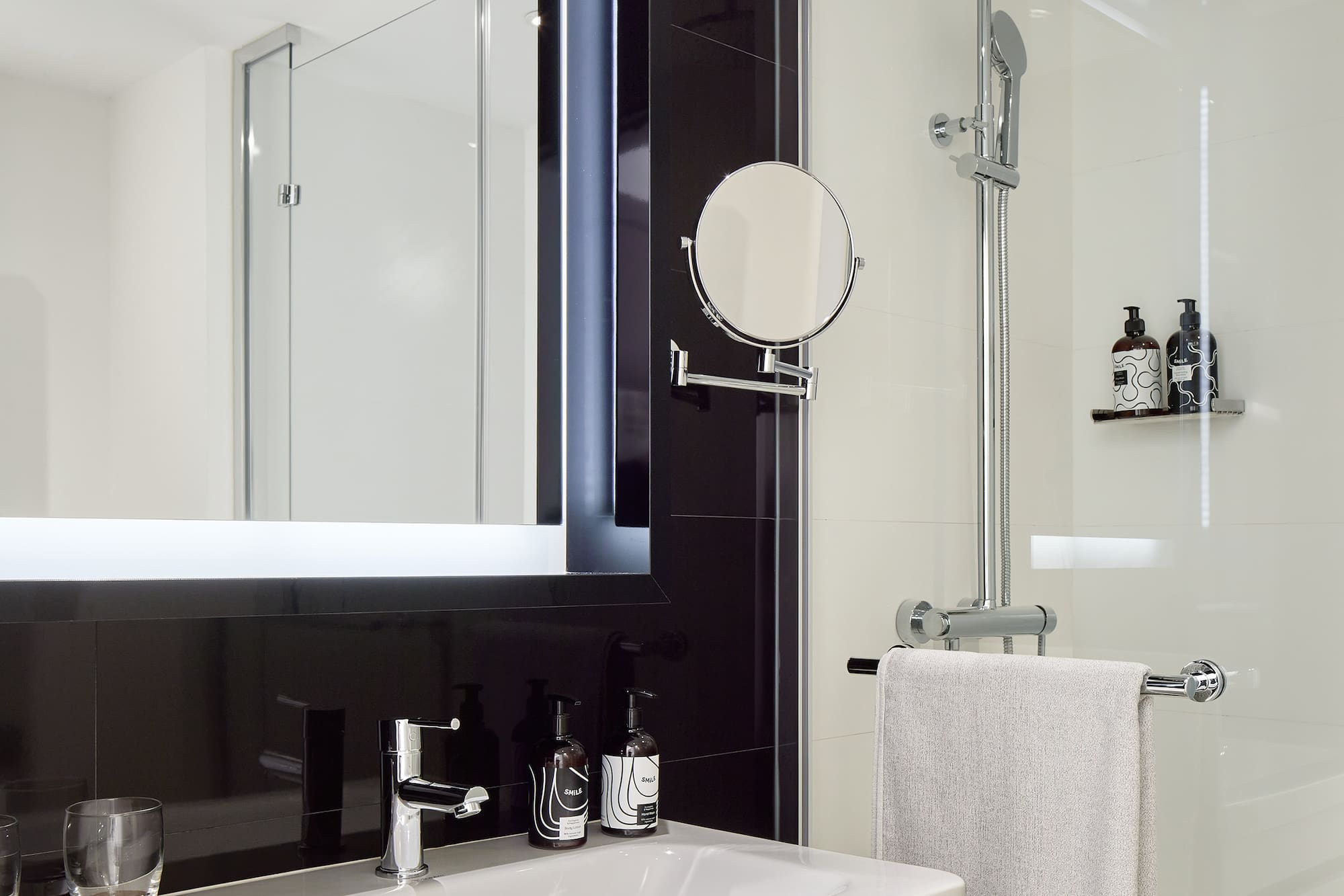 a bathroom with a mirror and sink