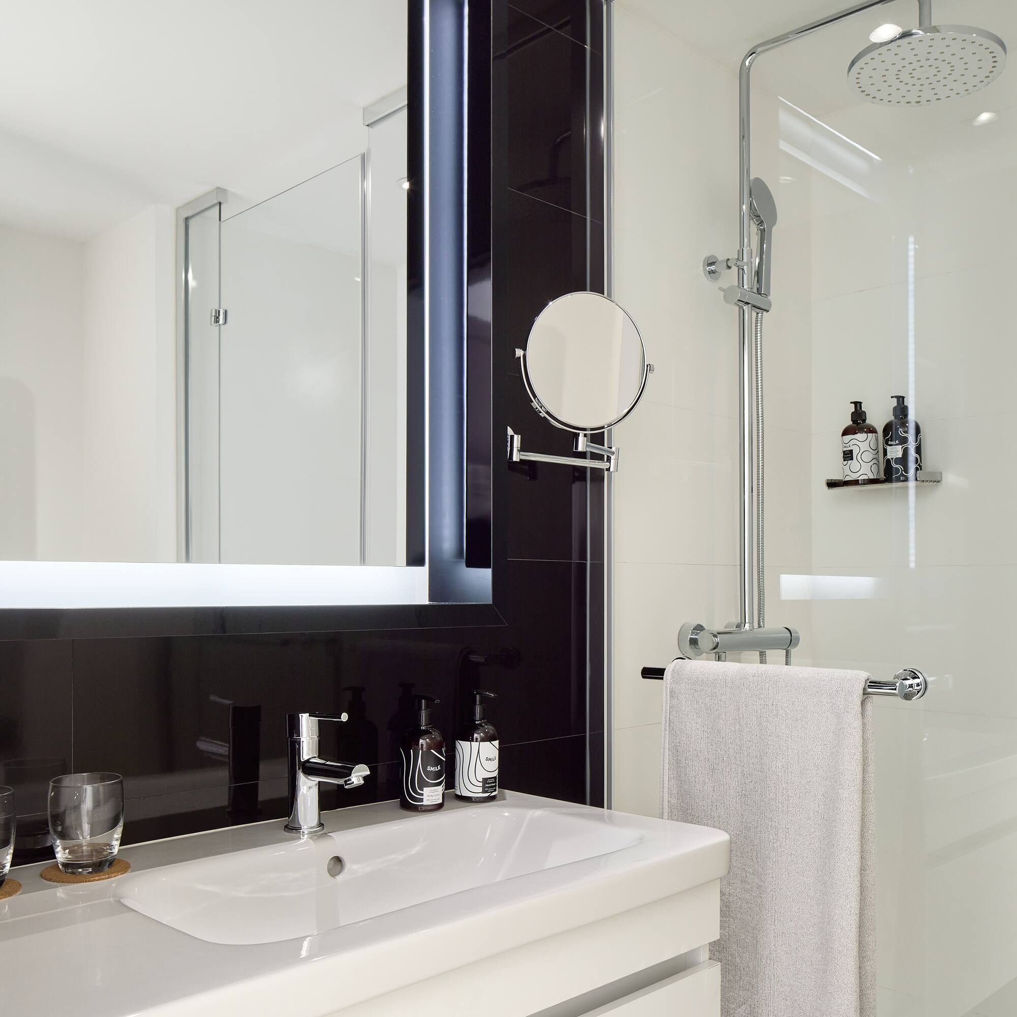 a bathroom with a mirror and sink