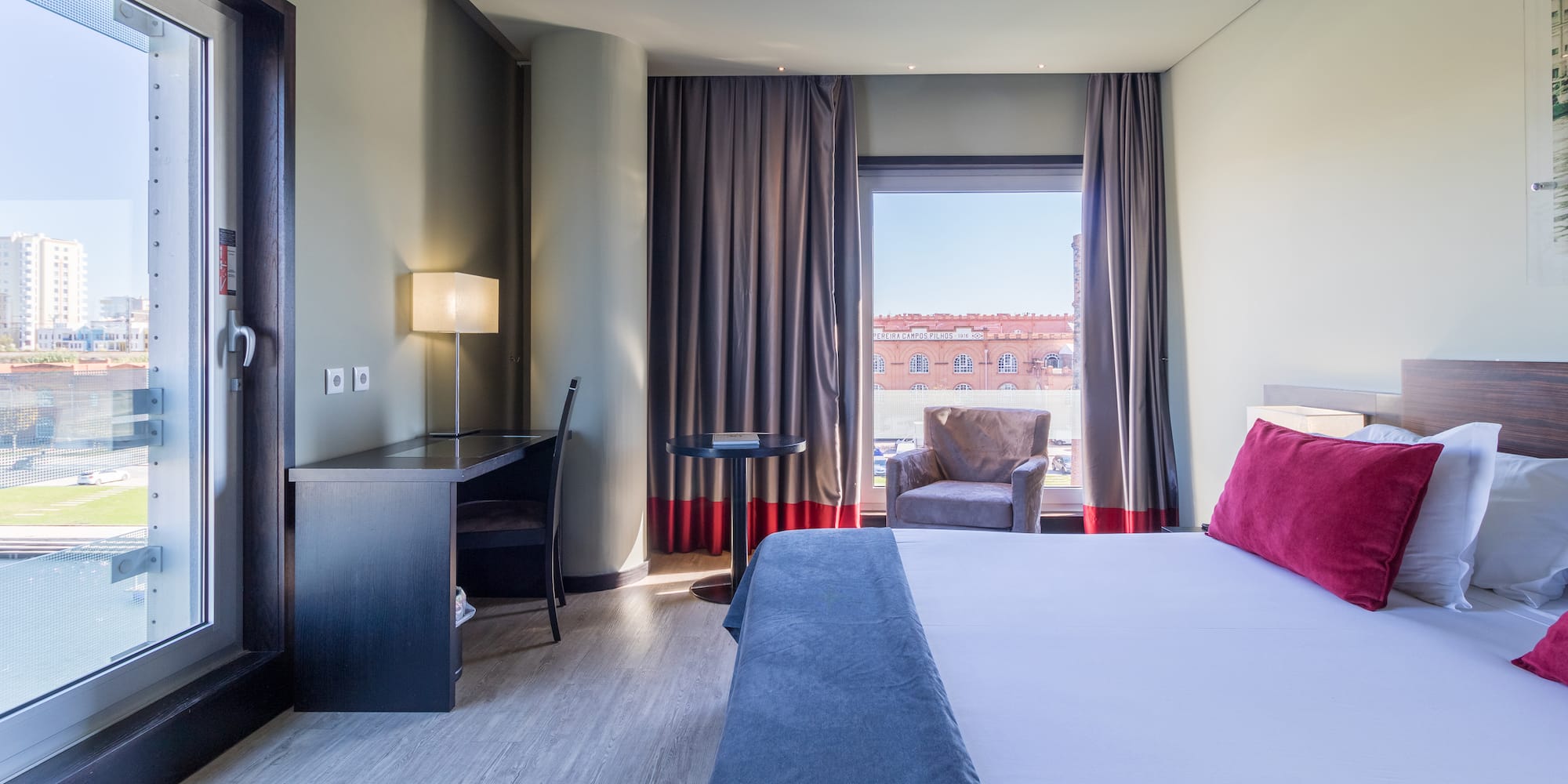 a room with a bed and a chair