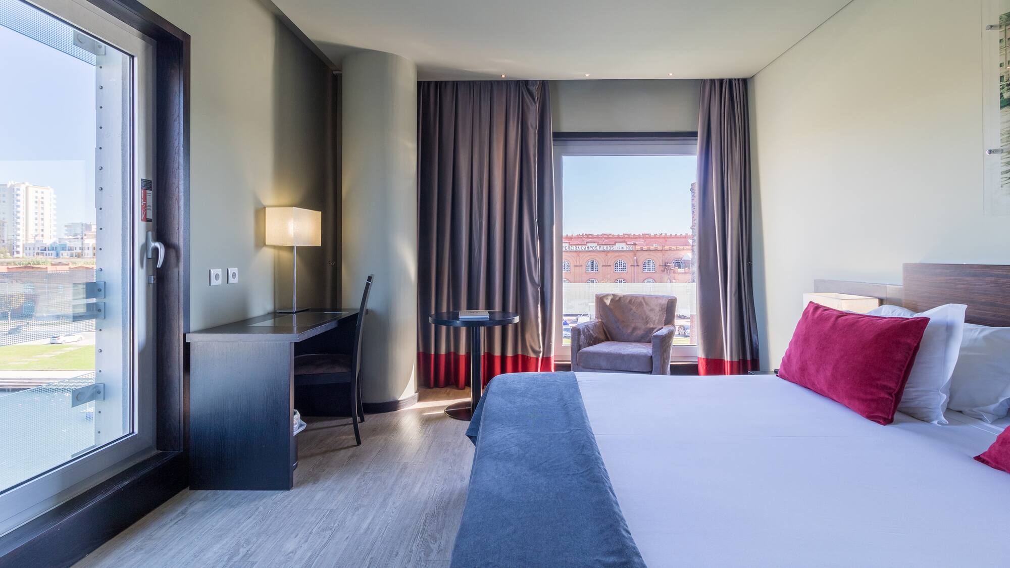 a room with a bed and a chair