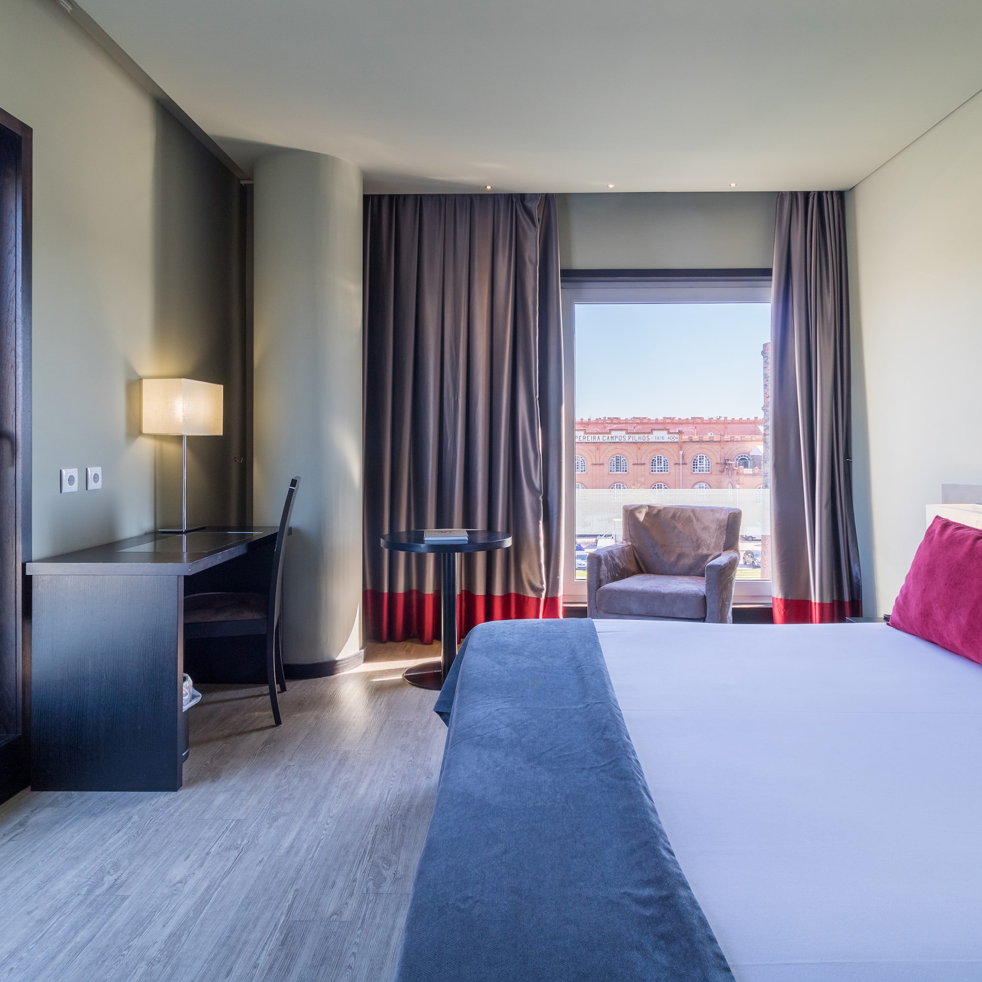 a room with a bed and a chair