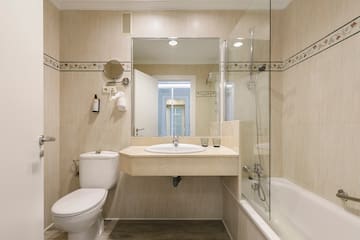 a bathroom with a sink and a shower