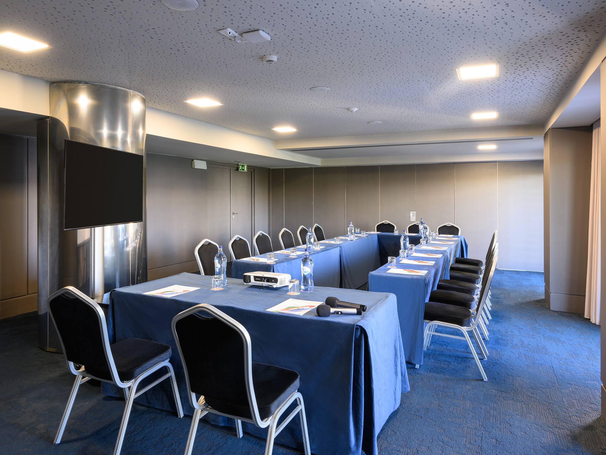 a room with a table and chairs