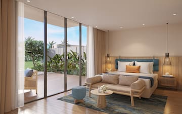 a bedroom with a bed and a table