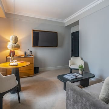 a room with a tv and a table