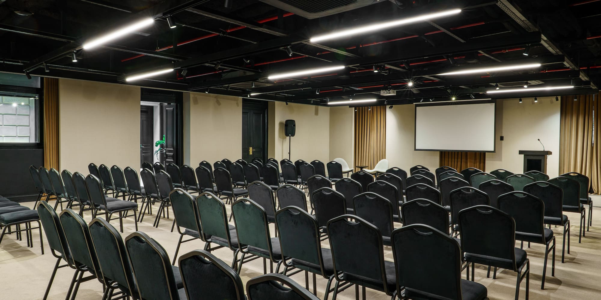 a room with rows of chairs