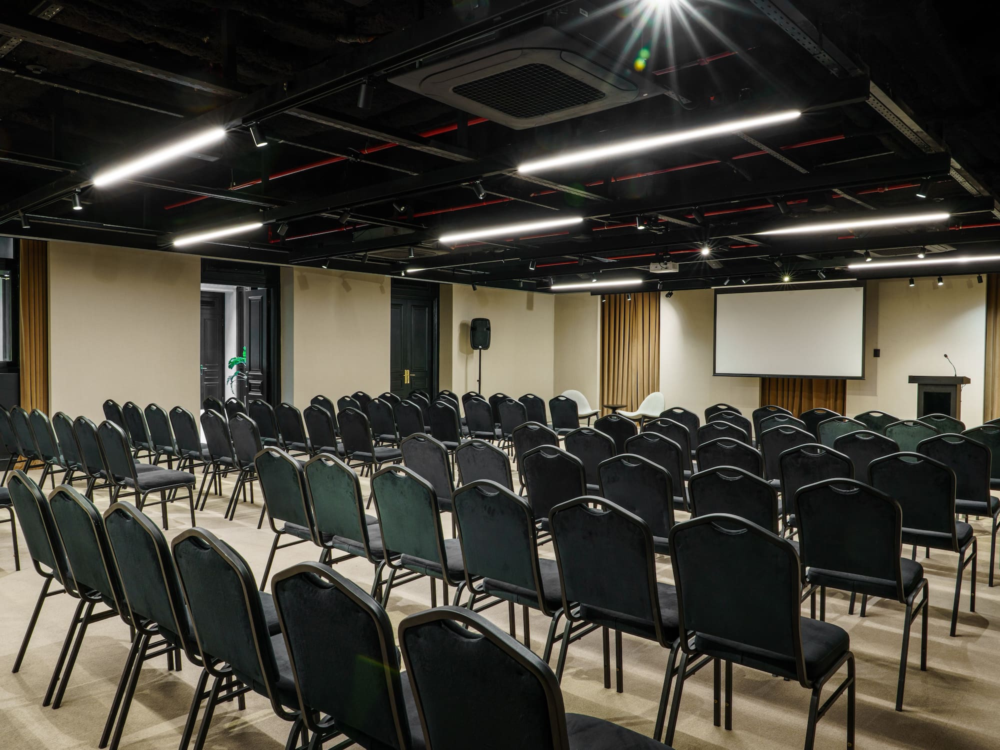 a room with rows of chairs