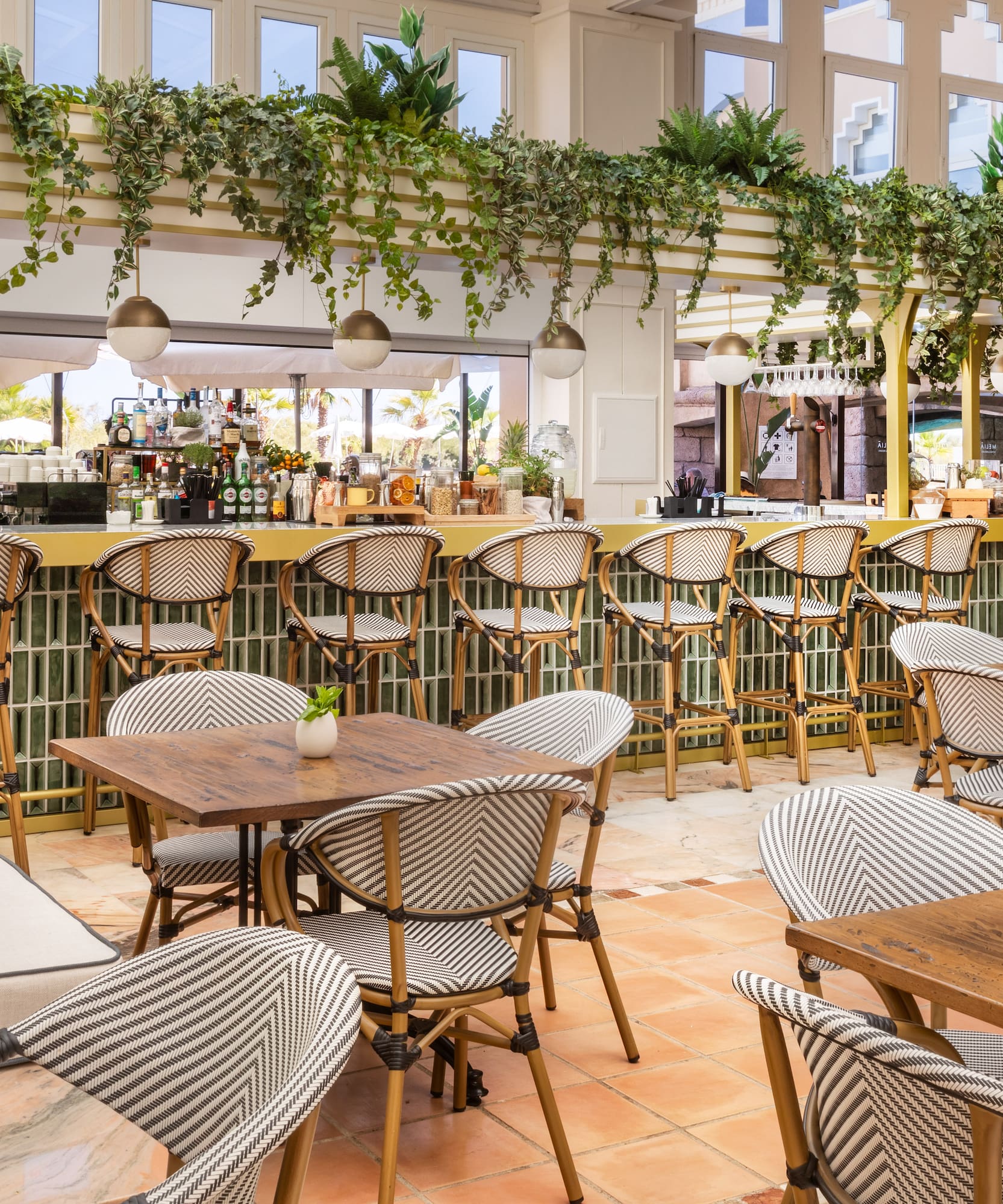a restaurant with tables and chairs