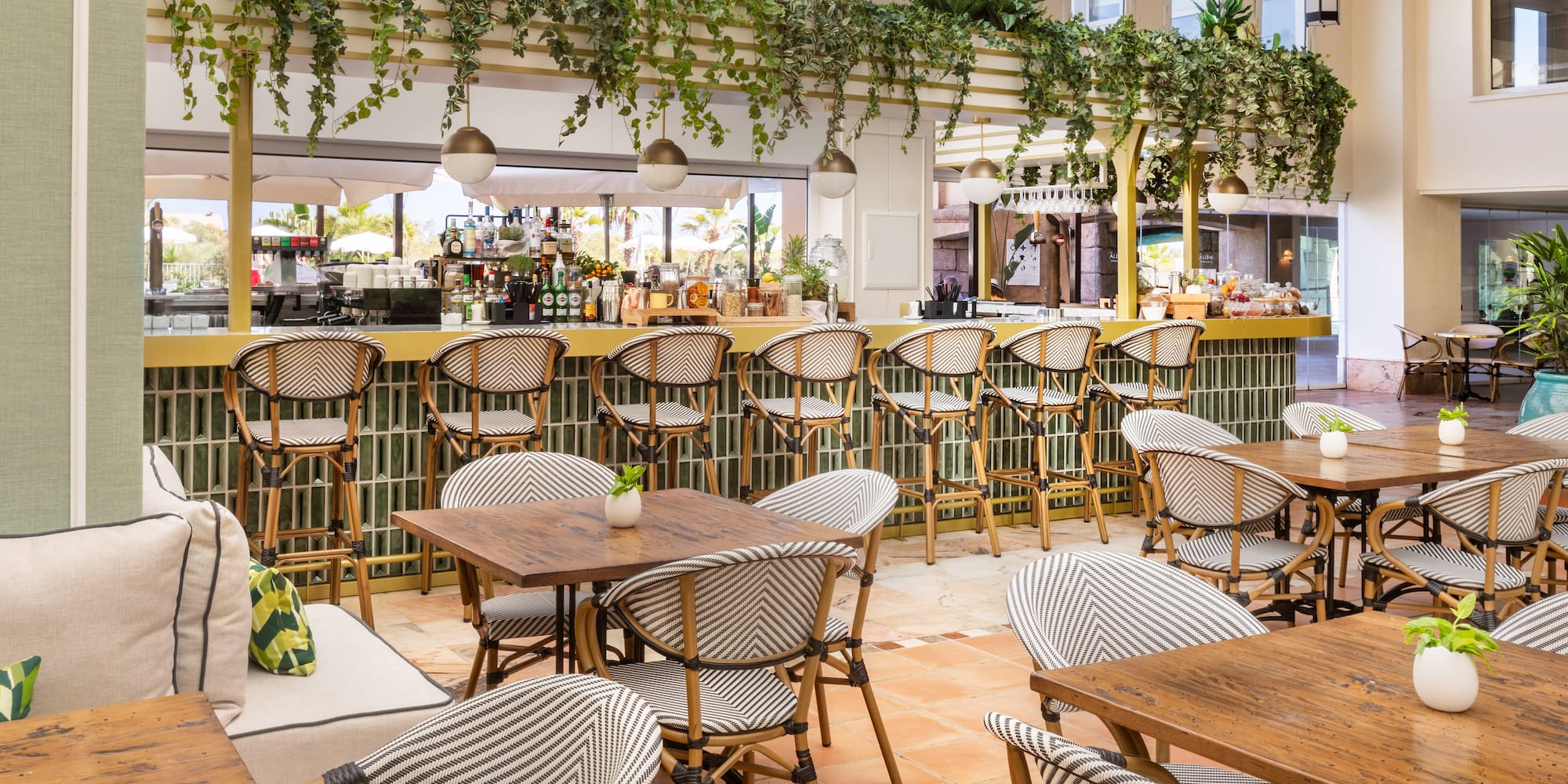 a restaurant with tables and chairs