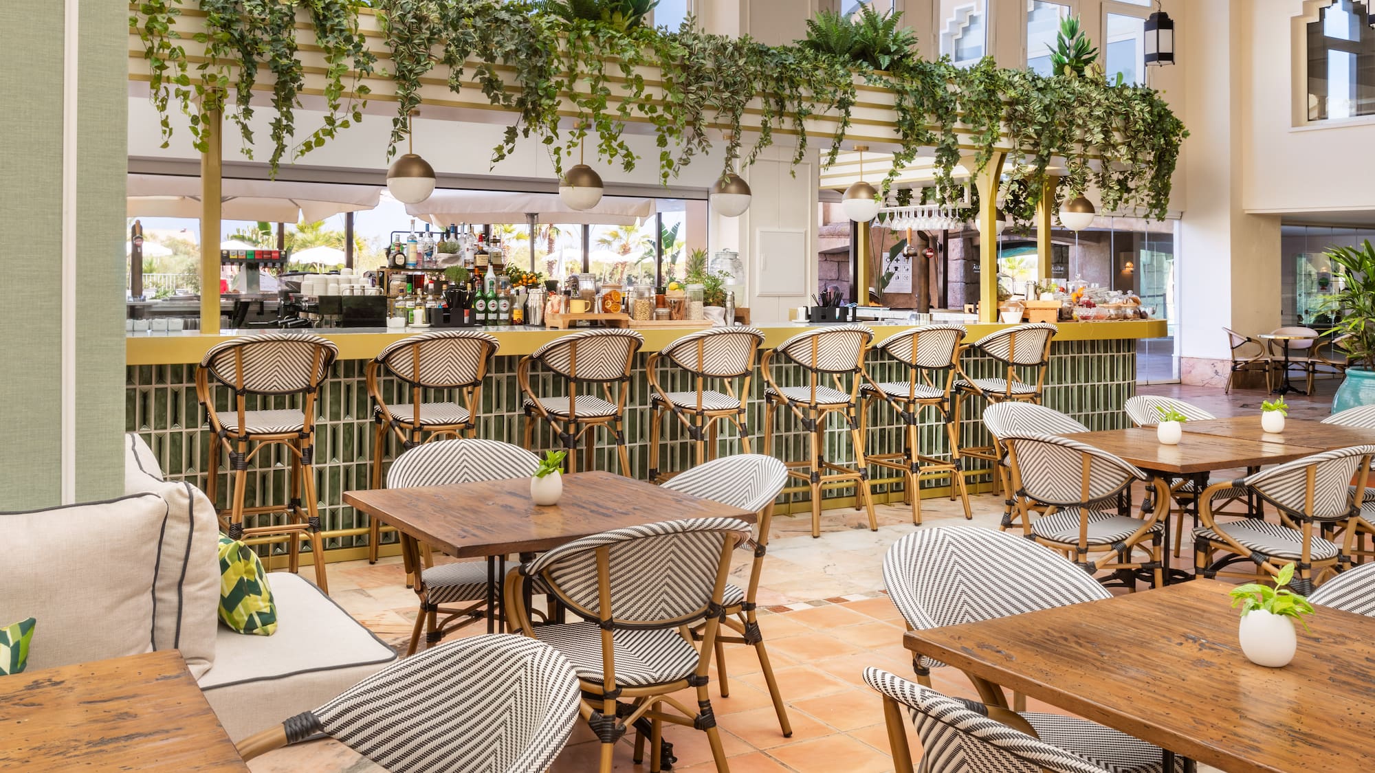 a restaurant with tables and chairs