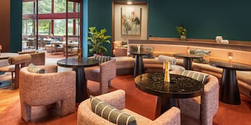 a room with tables and chairs