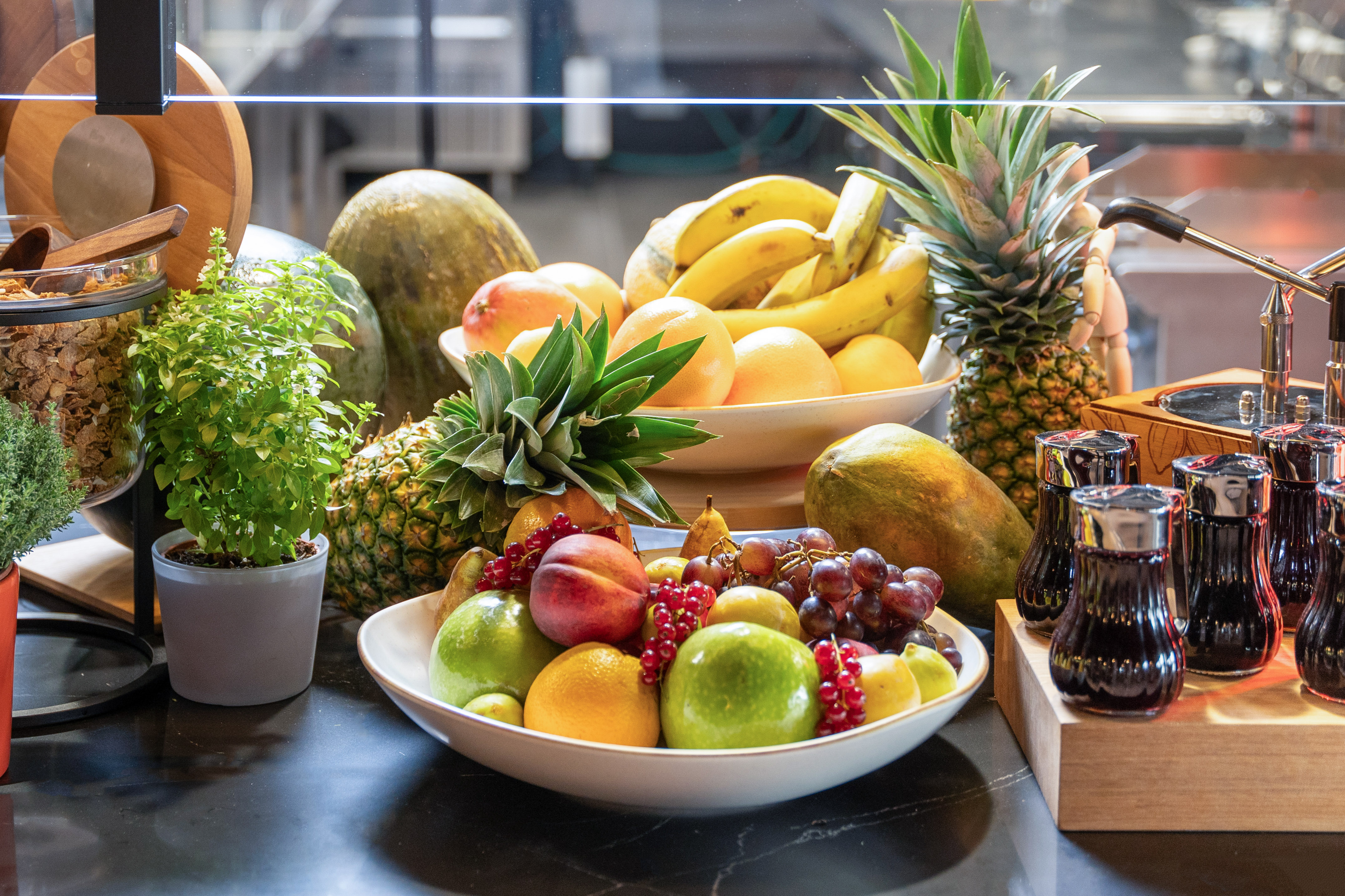 a bowl of fruit on a table