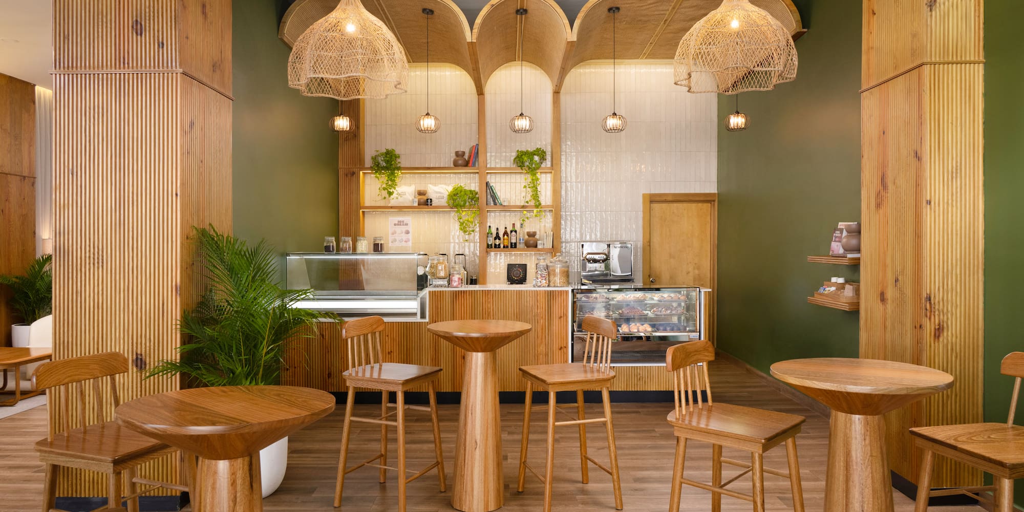 a room with tables and stools