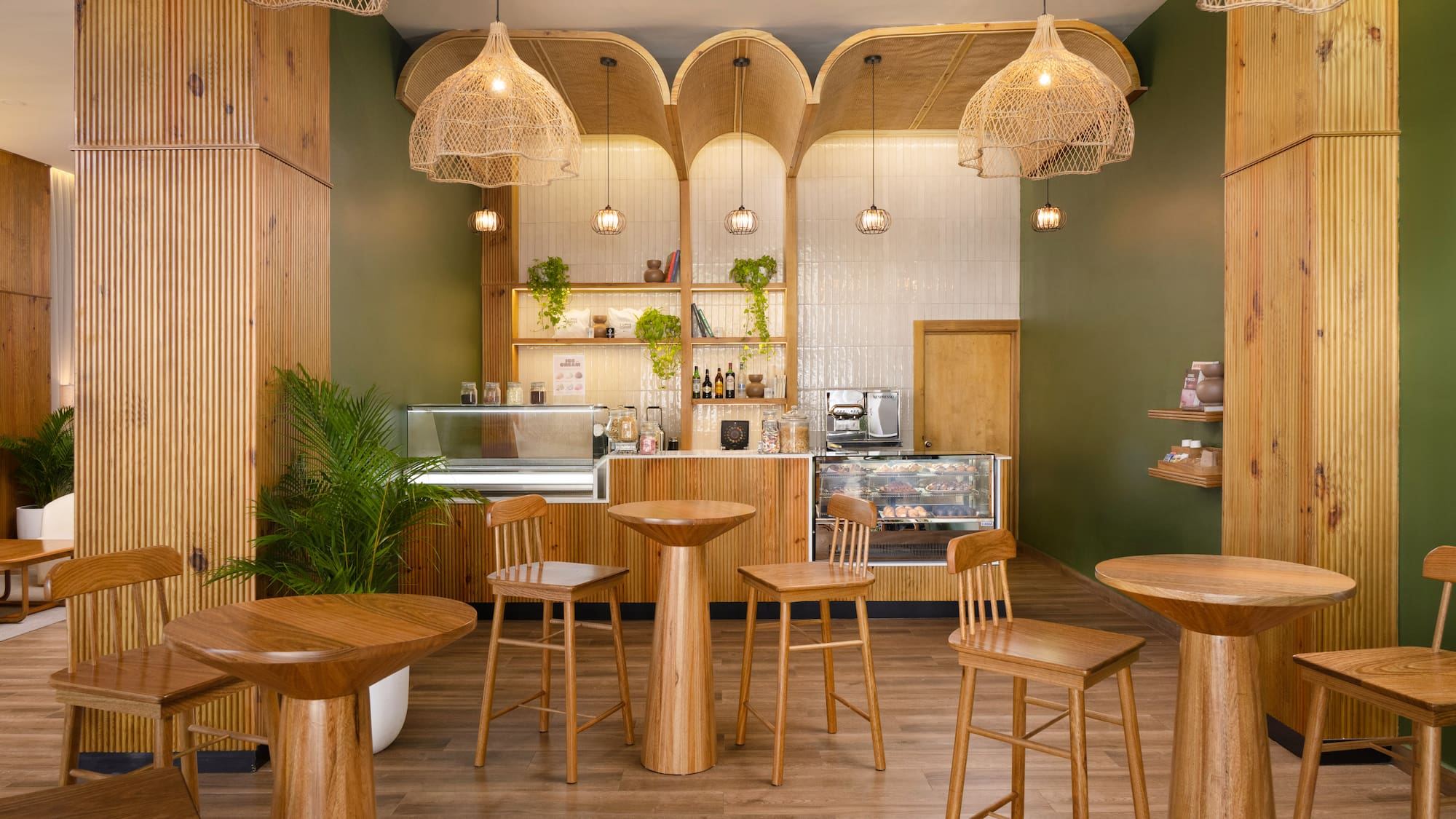 a room with tables and stools