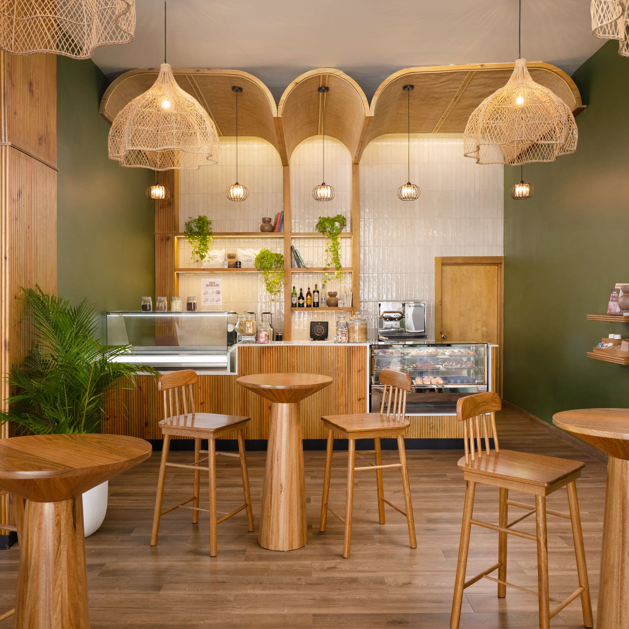 a room with tables and stools