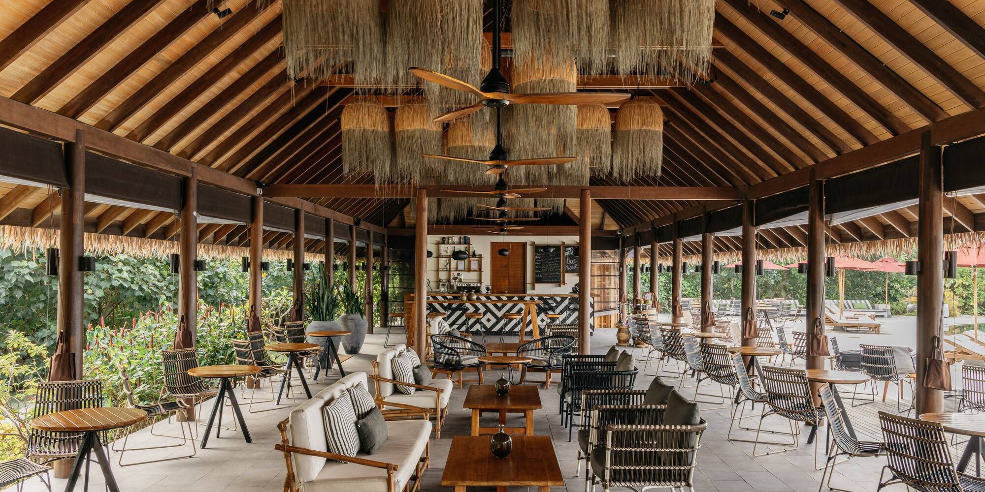 a room with chairs and tables