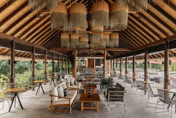 a room with chairs and tables