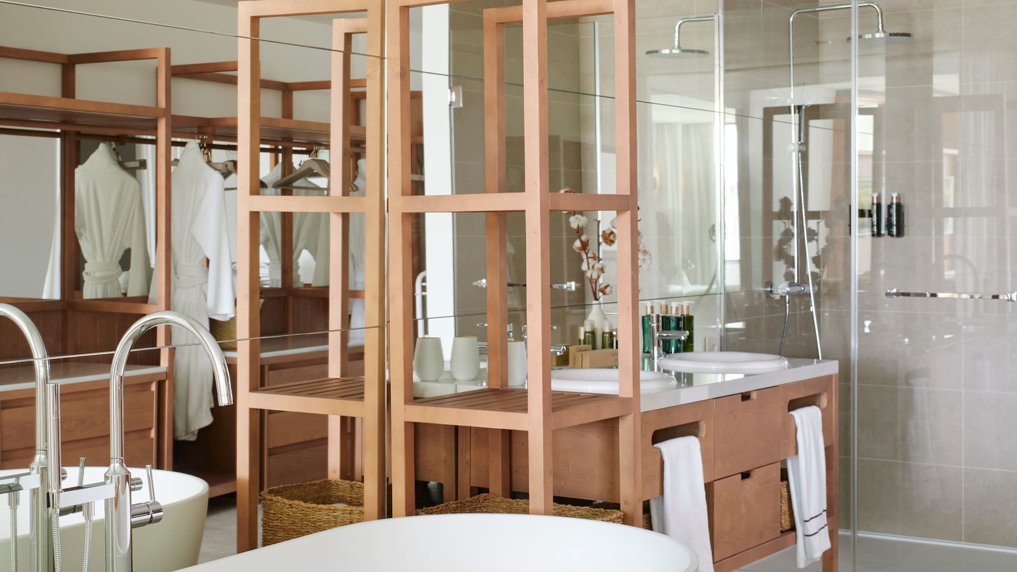 a bathroom with a large mirror and a sink