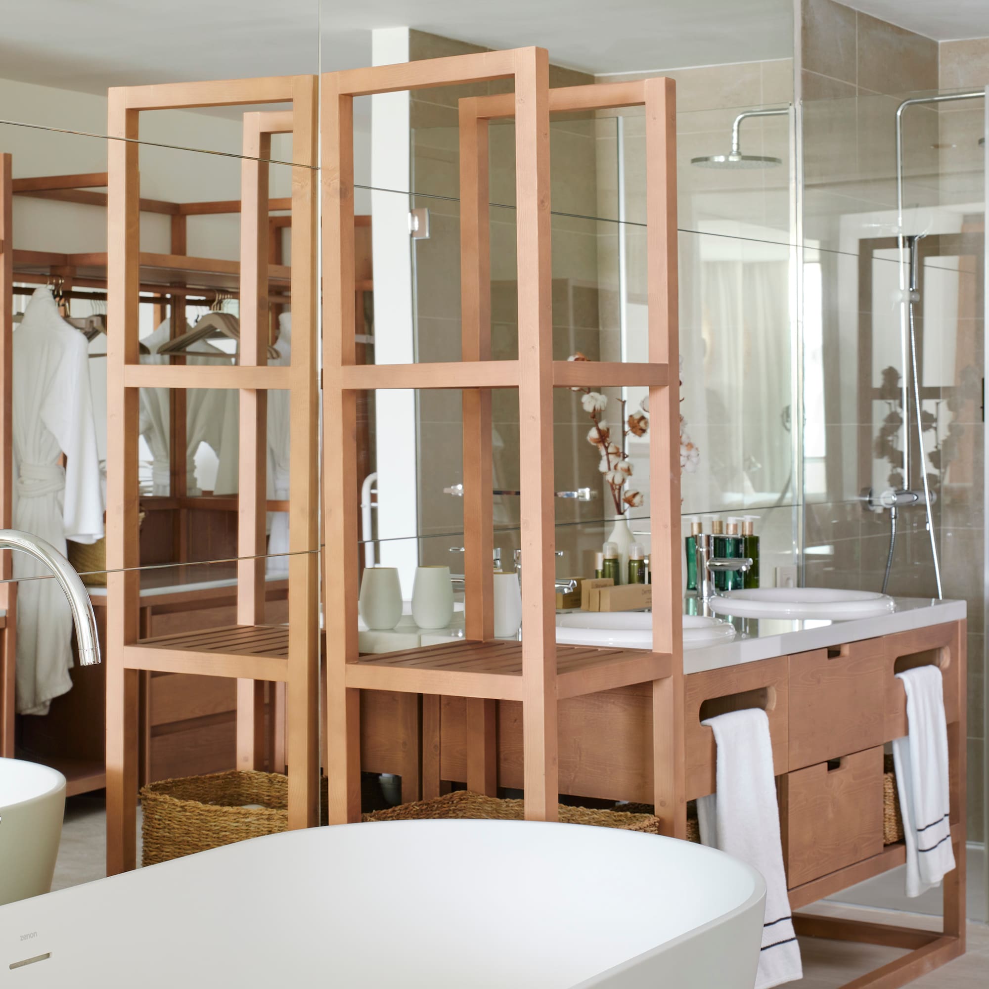 a bathroom with a large mirror and a sink