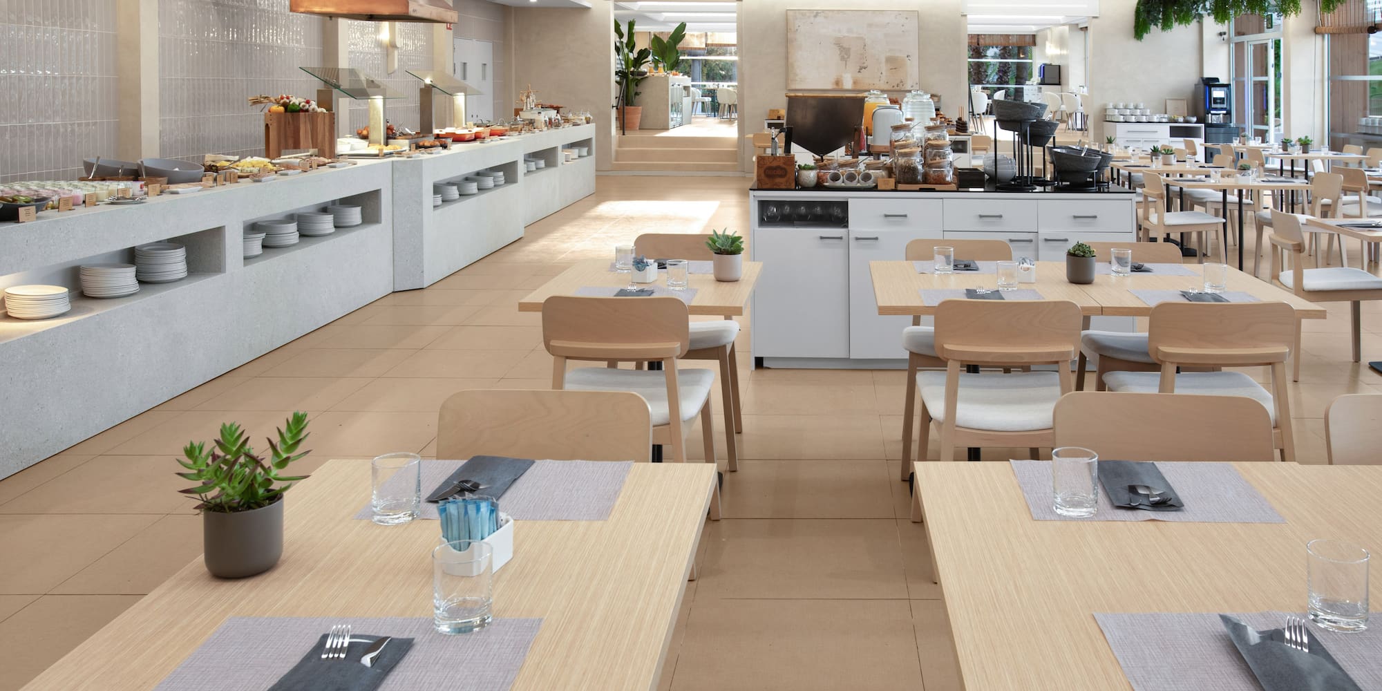 a restaurant with tables and chairs