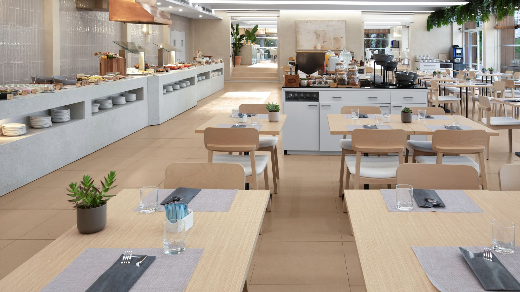 a restaurant with tables and chairs