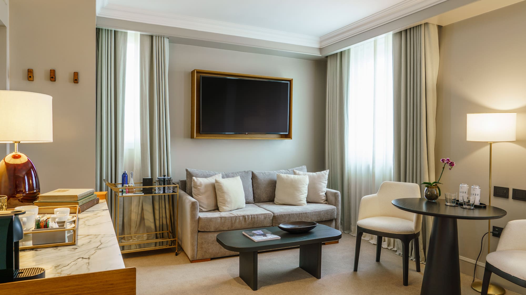 a living room with a television and a couch