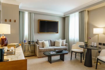 a living room with a television and a couch