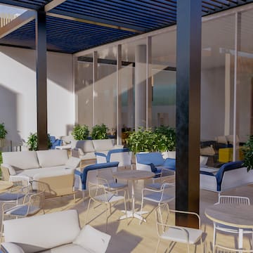 a patio with chairs and tables