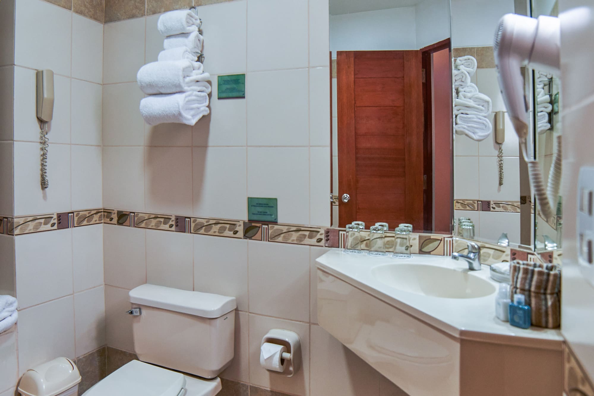 a bathroom with a sink and toilet