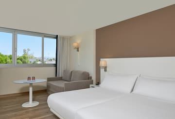 a room with a bed and a couch