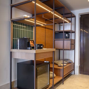 a room with a microwave and a microwave oven