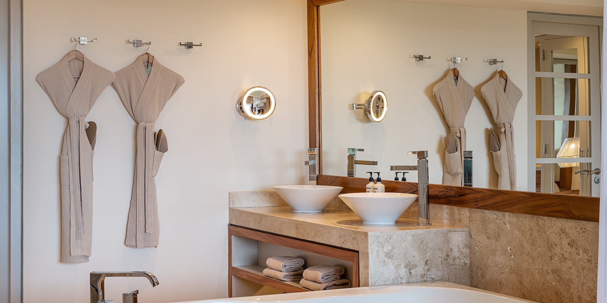 a bathroom with a bathtub and a bathtub