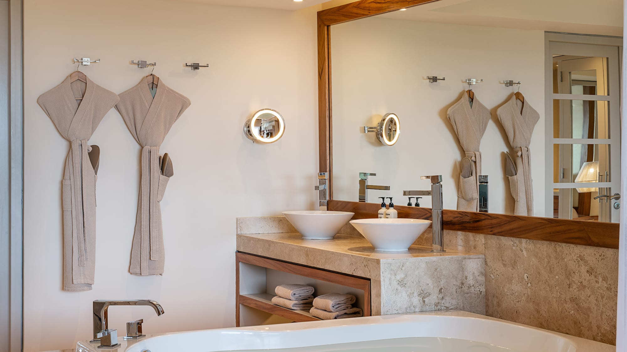 a bathroom with a bathtub and a bathtub