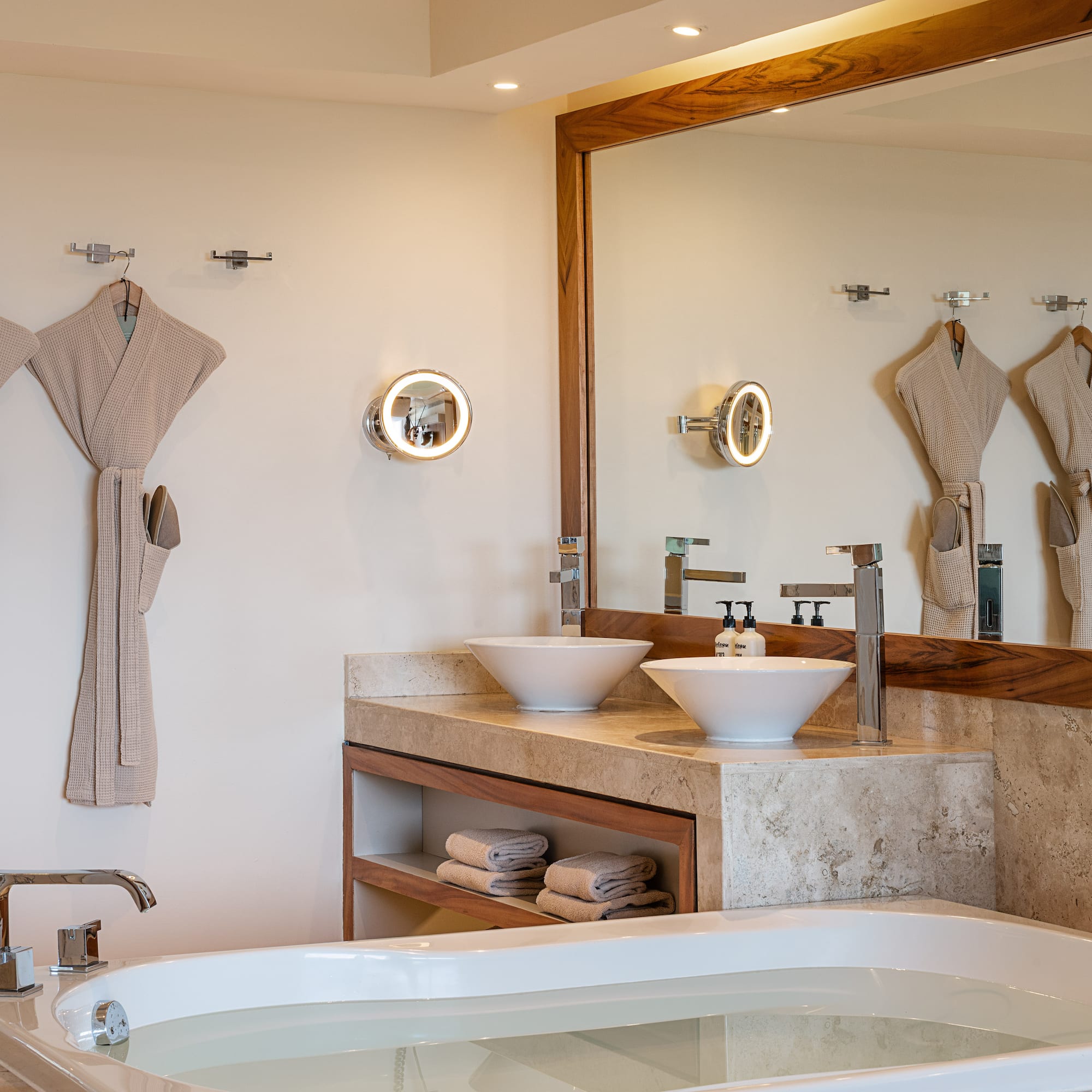 a bathroom with a bathtub and a bathtub