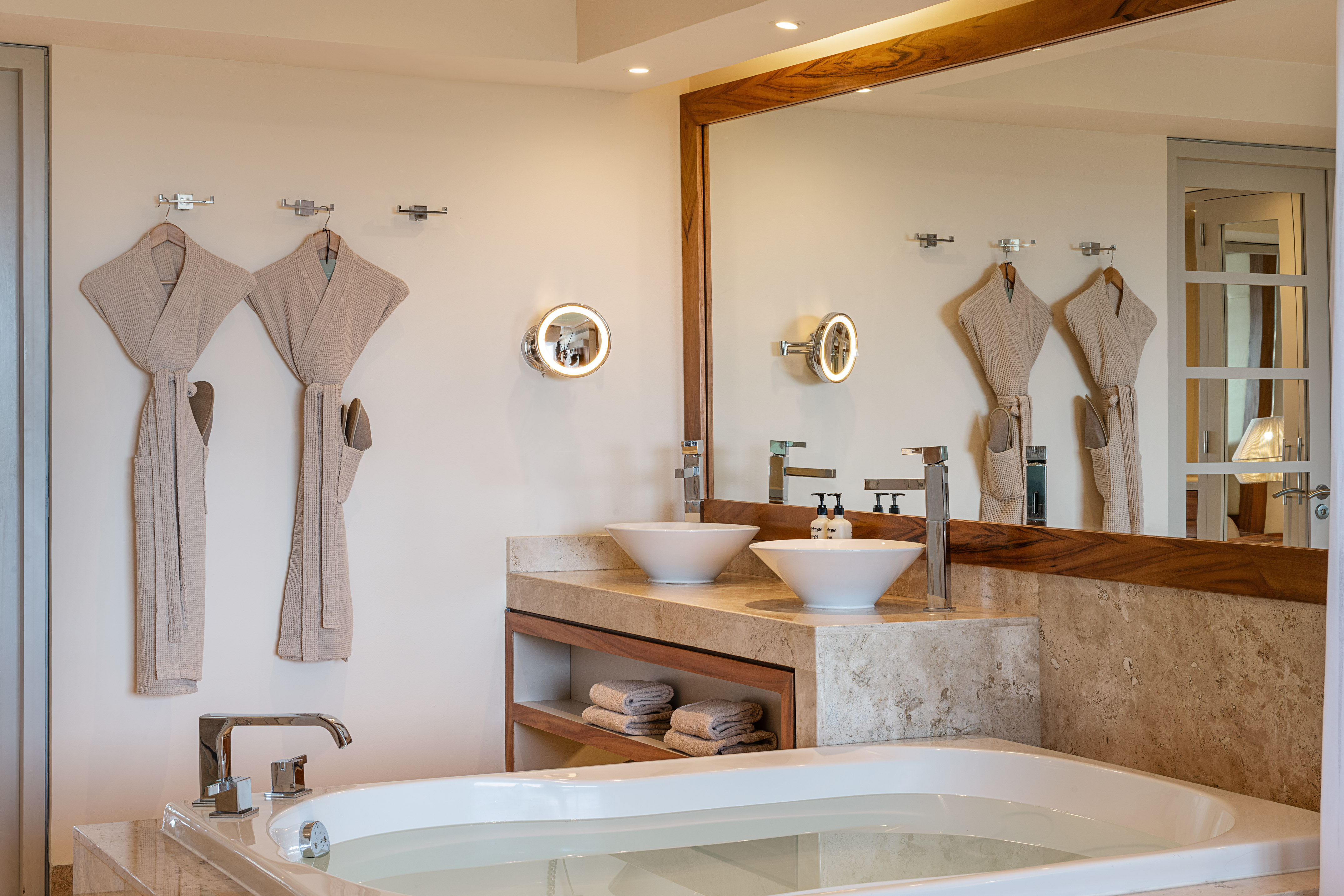 a bathroom with a bathtub and a bathtub