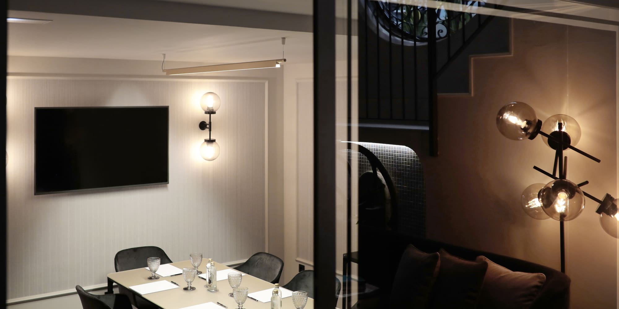 a room with a table and chairs