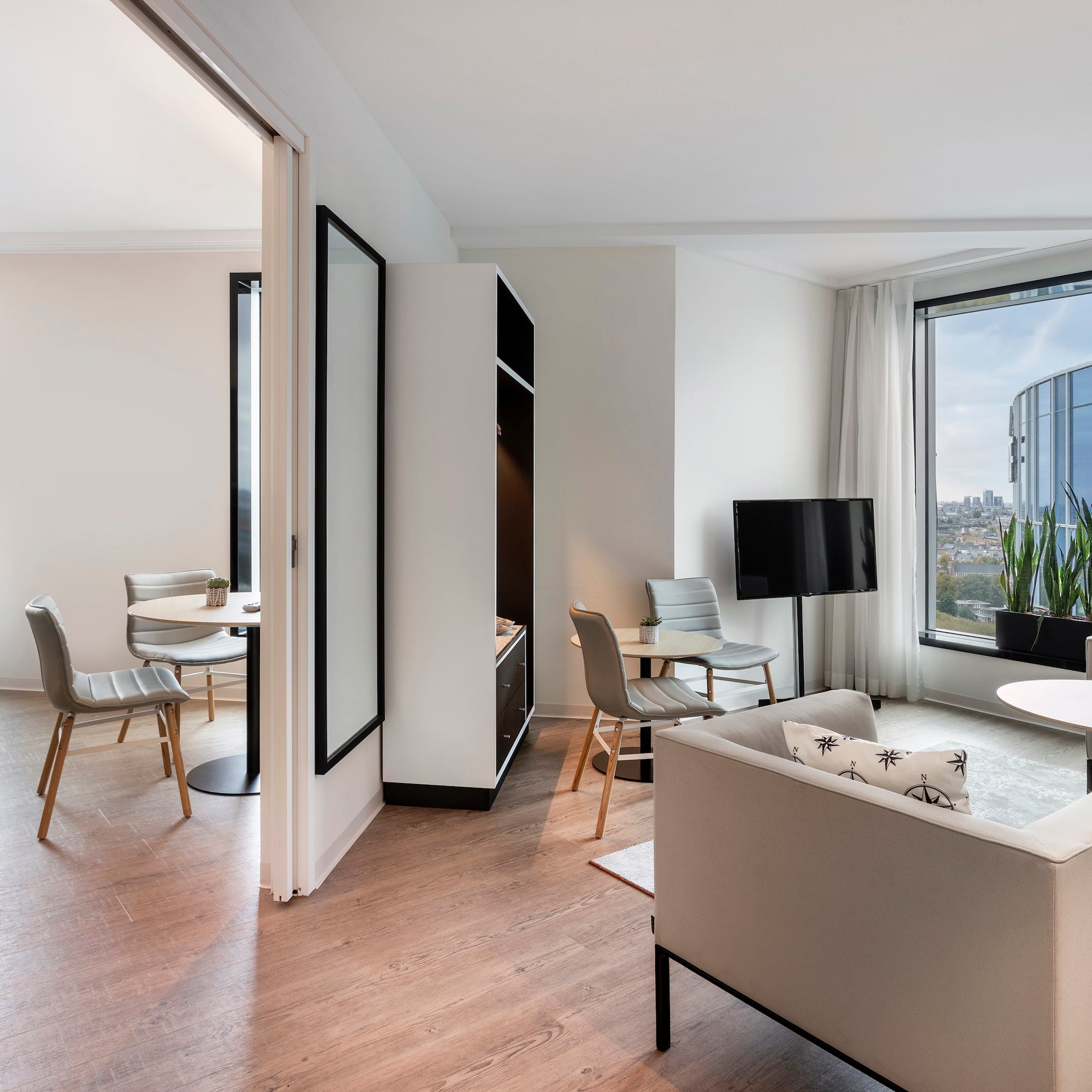 a room with a couch and a tv