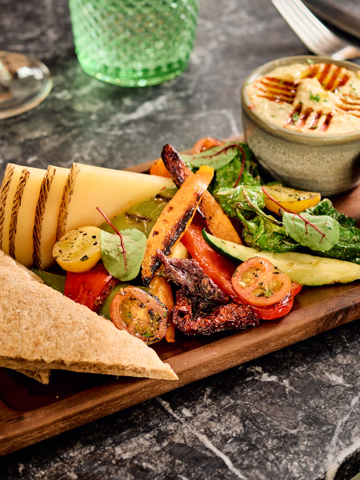 a plate of food on a marble surface