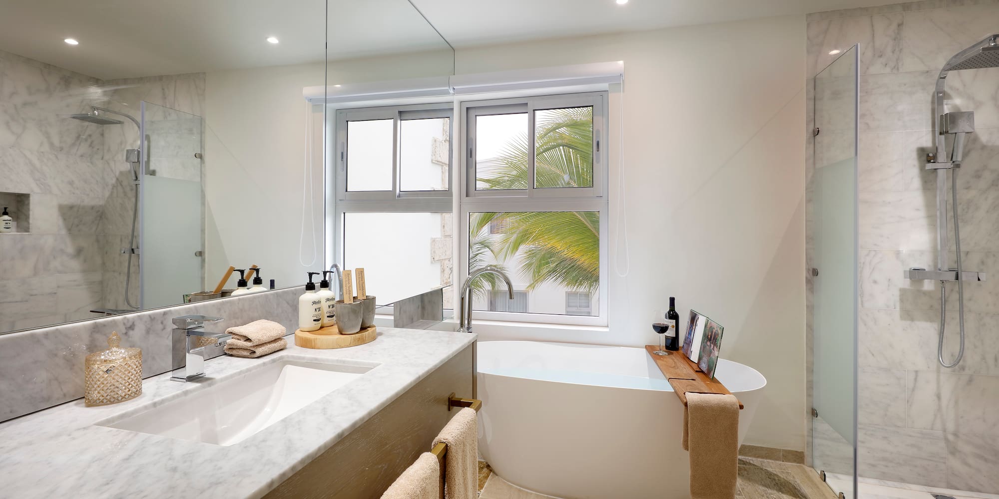 a bathroom with a large window and a tub